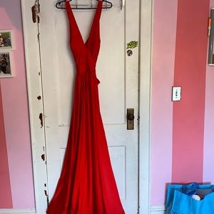 Gorgeous long red dress!! Size large worn 1 time to a wedding. Great for prom !